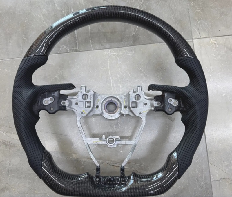 Кольцо руля от Toyota Camry V75 Carbon